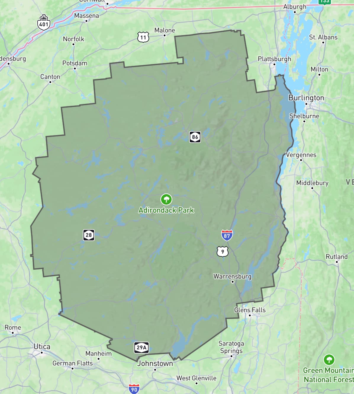 A shaded polygon showing the exact shape of the boundary of Adirondack Park, overlayed on a map of the area